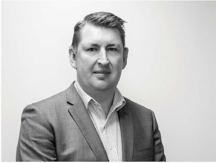 Scott Enno, the founder of Flooring Xtra