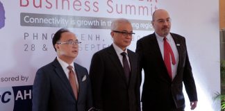 Kith Meng, DPM Aun Pornmoniroth and Tassilo Brinzer pose for photo at the ASEAN-Cambodia Business Summit 2023