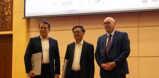 H.E. Suon Sophal, Mr. Youn Heng and Dr. Stefan Hanselmann pose for photo at the Investment Promotion Conference 2023