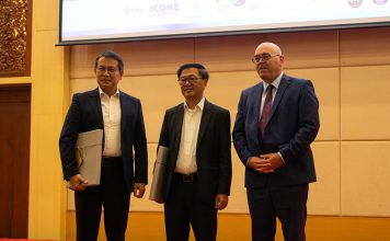 H.E. Suon Sophal, Mr. Youn Heng and Dr. Stefan Hanselmann pose for photo at the Investment Promotion Conference 2023