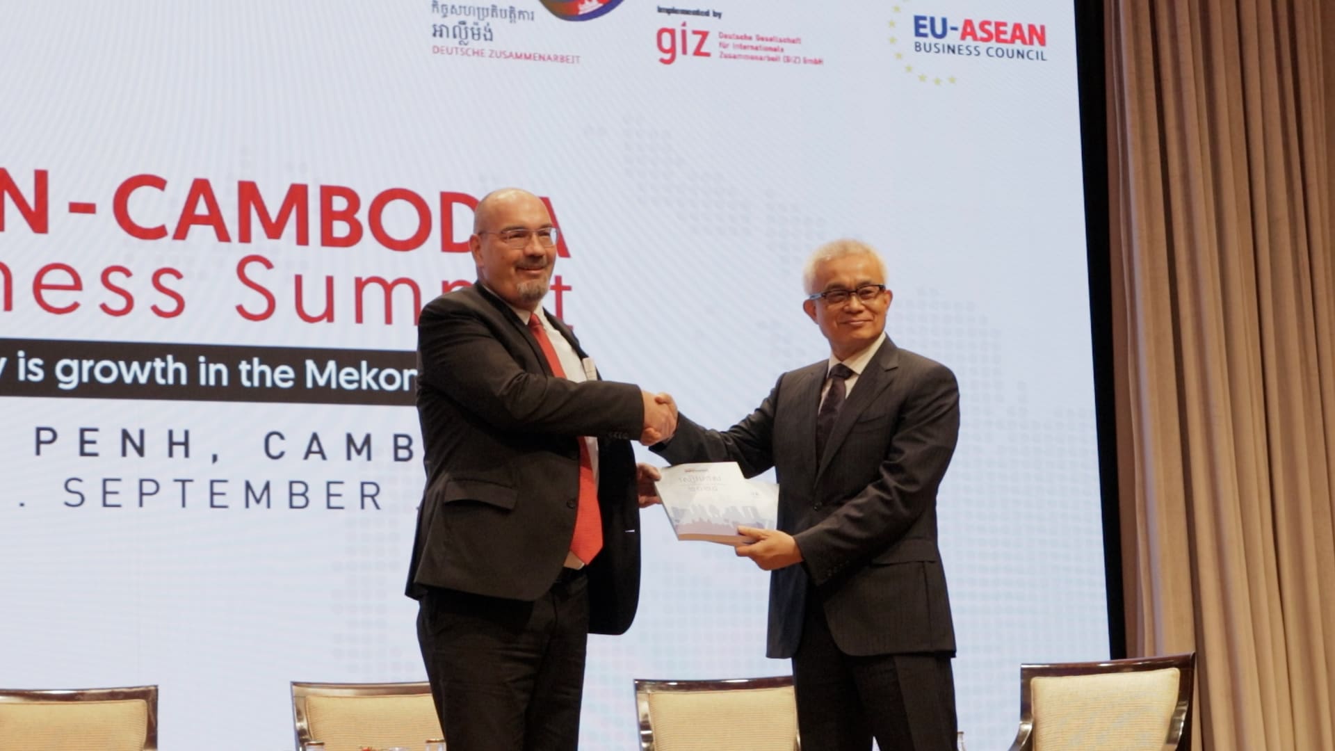 EuroCham Cambodia handover White Book 2024 to DPM Aun Pornmoniroth at ASEAN-Cambodia Business Summit 2023