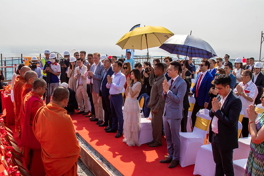 Prayers led by the Venerable Kou Sopheap at the Urban Village Phase II topping out ceremony.